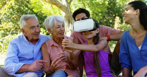 Family Enjoying Outdoor Virtual Reality Experience Together