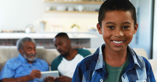 Smiling Boy with Multigenerational Family at Home - Download Free Stock Images Pikwizard.com