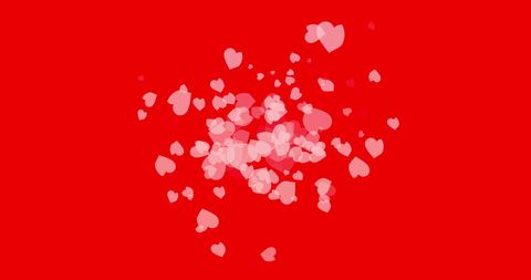Floating Pink Hearts on Vibrant Red Background for Romantic Themes