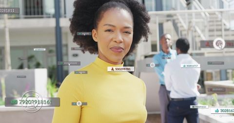 Confident African American Businesswoman with Digital Data Visualization