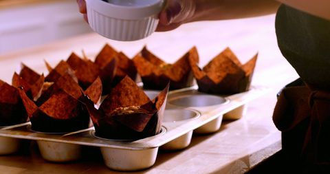 Chef Preparing Gourmet Muffins in Cafe Kitchen