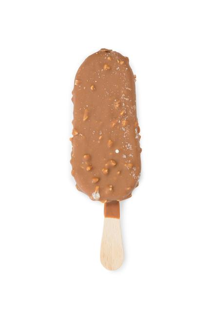 Close-up view of a chocolate ice cream bar on a wooden stick, isolated on a white background. The ice cream is coated with a layer of chocolate and sprinkled with nuts. Perfect for use in food blogs, dessert menus, summer promotions, and advertisements for frozen treats.