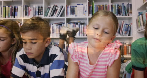 Children Reading with Digital Data Overlay in Library