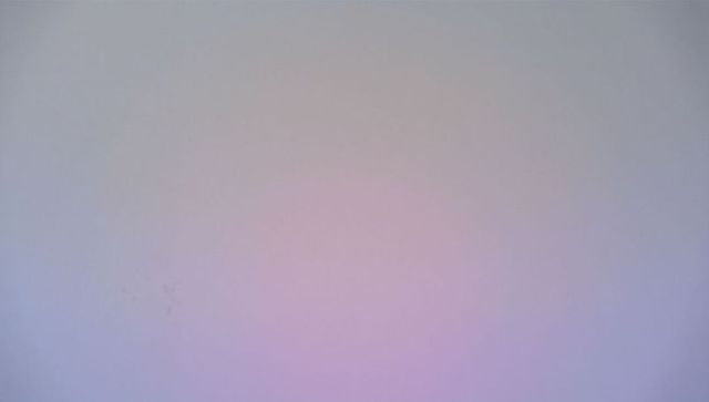 Pastel gradient interior wall showing subtle smudges and scuffs for minimalist backdrop