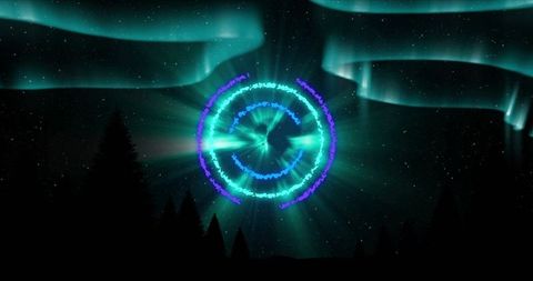 Vibrant glowing circles and light trails in night sky