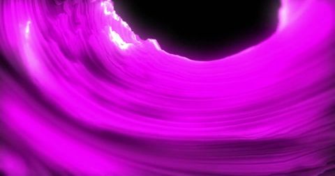Dynamic abstract purple swirl on black background