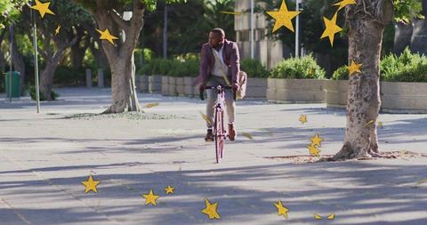 Mature professional cycling in urban plaza with star graphics