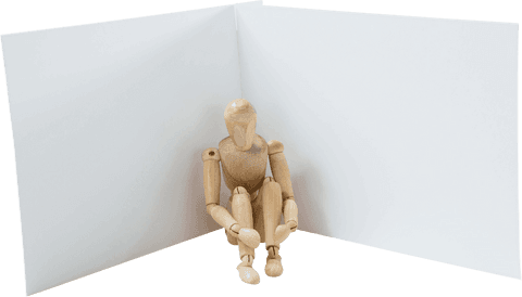Transparent Wooden Figurine Seated by White Display Board