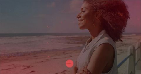 Woman enjoying ocean view in beachside serenity