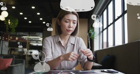 Businesswoman Engaging with Digital Media Interface at Work