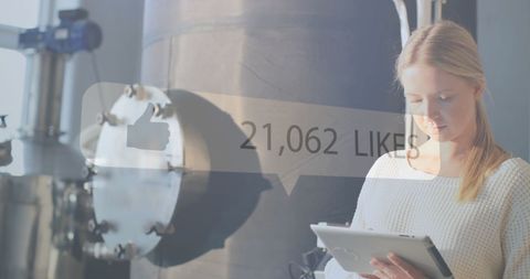 Woman Using Tablet in Industrial Environment with Like Overlay - Download Free Stock Images Pikwizard.com