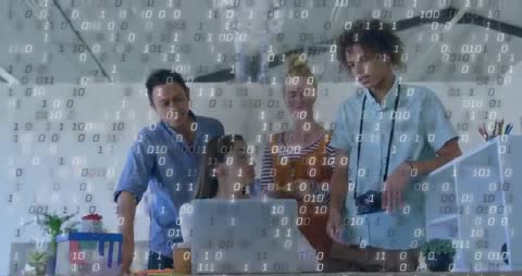 Team Collaborating with Digital Technology in Innovative Workspace