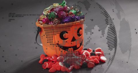 Orange Jack-o-lantern Bucket Overflowing with Halloween Candy, Halftone Dots, Festive