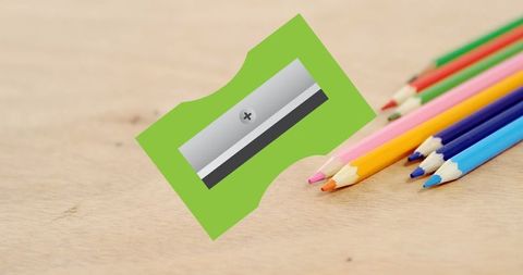 Colorful Pencils and Green Pencil Sharpener Desktop - Download Free Stock Images Pikwizard.com