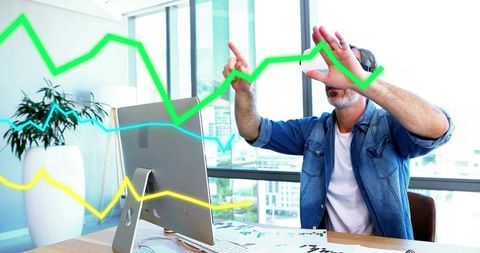 Businessman Analyzing Data with Interactive Graphs in Modern Office