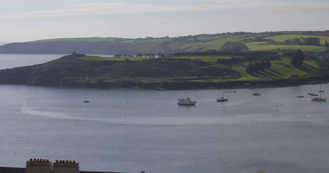 Boats Anchored in Calm Bay with Scenic Hills in Background - Download Free Stock Images Pikwizard.com