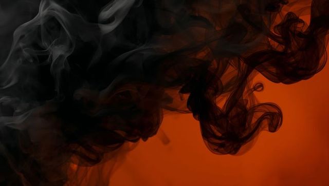 Swirling Dark Smoke on Gradient Studio Backdrop