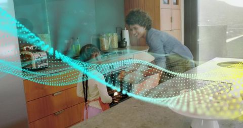 Parent helping child baking together in modern kitchen sharing joyful family baking moment