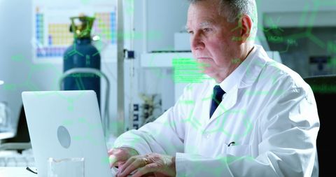 Senior Scientist Analyzing Medical Data on Laptop in Laboratory - Download Free Stock Images Pikwizard.com
