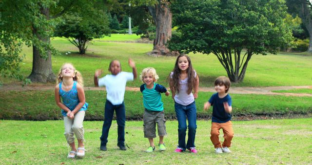 Happy Children Playing Outdoors in a Park on a Sunny Day - Download Free Stock Images Pikwizard.com