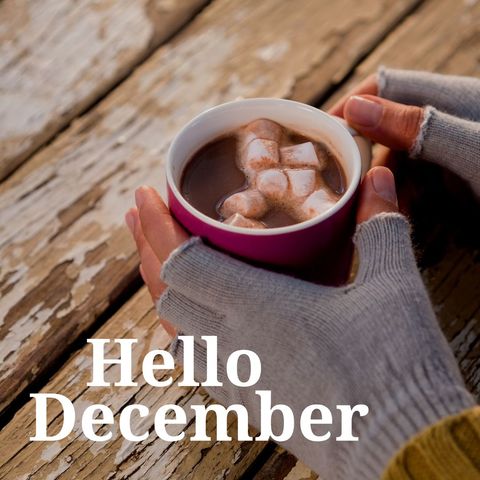 Hands with fingerless mittens holding mug of hot chocolate topped with marshmallows, reflecting warmth and holiday season. Use for winter greetings, holiday cards, cozy-themed social media posts.