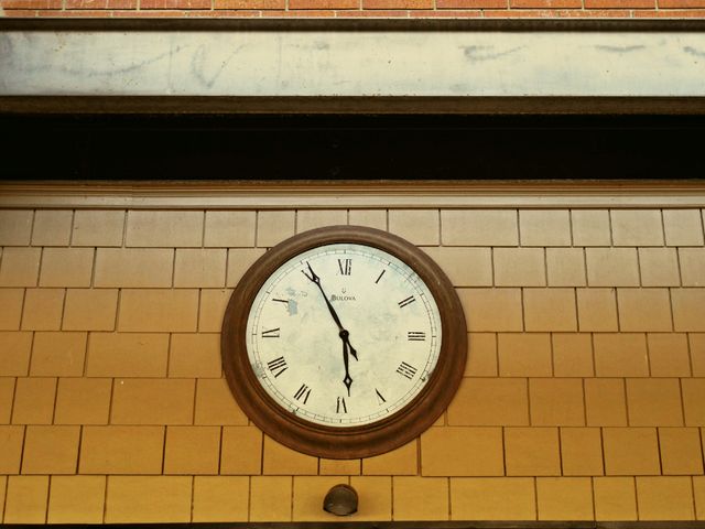 Vintage Clock on Brick Building Showing 10:15 - Download Free Stock Photos Pikwizard.com