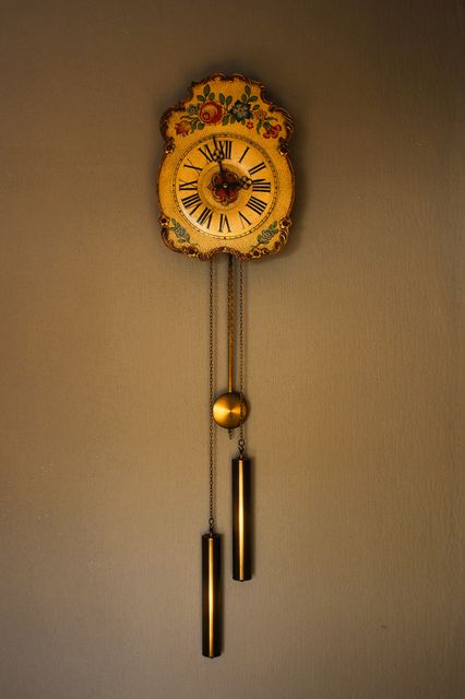 Vintage Pendulum Wall Clock with Floral Design - Download Free Stock Photos Pikwizard.com