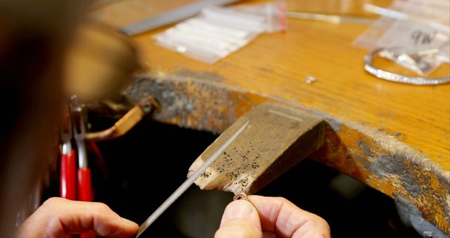 Jeweler Crafting Ring on Workbench Using Traditional Tools - Download Free Stock Images Pikwizard.com