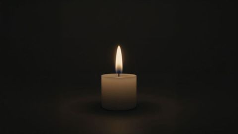 Warm Glow of Single Candle in Dark Space Creating Tranquil Ambiance