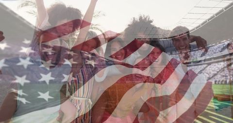 Diverse Group Cheering at Sports Stadium with US Flag