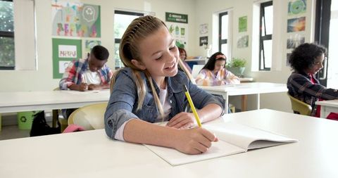 Diverse Students Engaged in Classroom Learning at Bright School