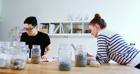 Young professionals collaborating at creative workspace