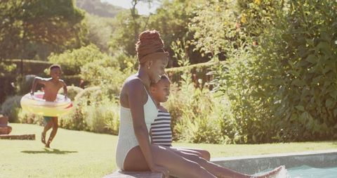 Family Enjoying Sunny Day at Poolside Retreat - Download Free Stock Images Pikwizard.com