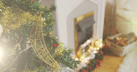 Cozy Living Room with Decorated Christmas Tree and Illuminated Fireplace - Download Free Stock Images Pikwizard.com