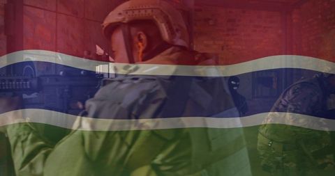 Tactical operator aiming and moving through urban training with national flag overlay
