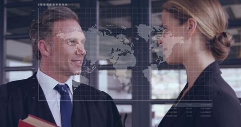 Business professionals discussing global strategy using holographic world map overlay