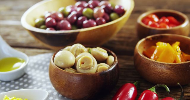 Assortment of Mediterranean Vegetables and Olives in Wooden Bowls - Download Free Stock Images Pikwizard.com