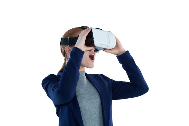 Surprised young businesswoman wearing vr glasses against white background