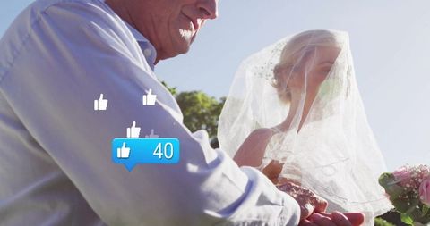 Father Joyfully Holding Bride at Garden Wedding with Social Media Reactions