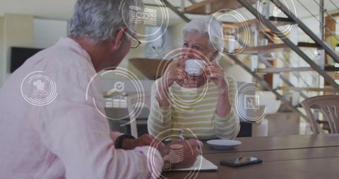 Senior couple discussing technology innovative future