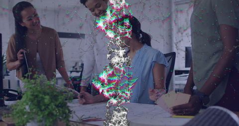 Diverse creative team collaborating over blueprints with neon glitch data overlay