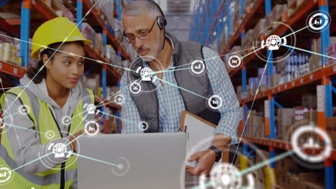 Diverse Warehouse Team Analyzing Data with Virtual Connections
