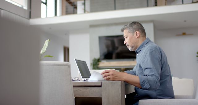 Focused Man Working from Home on Laptop - Download Free Stock Images Pikwizard.com