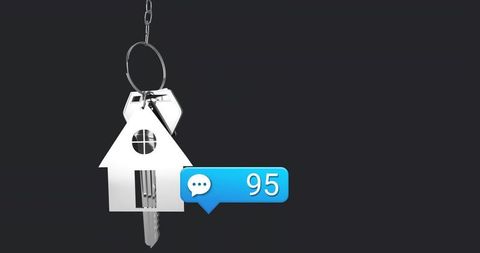 Hanging house keychain showing chrome keys and blue notification badge 95