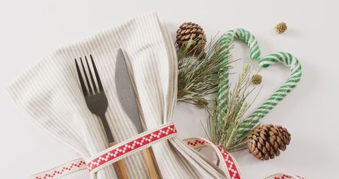 Festive Christmas Place Setting with Cutlery and Candy Canes - Download Free Stock Images Pikwizard.com