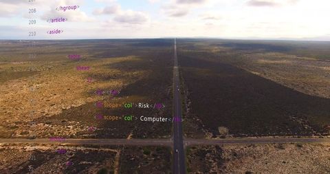 Aerial view of endless rural road with digital code overlay