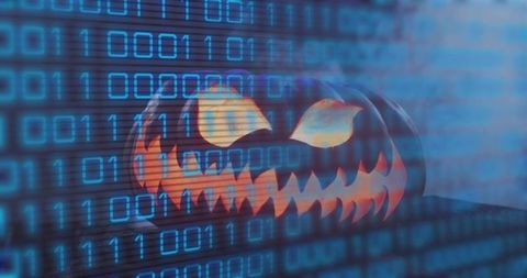 Glowing jack-o'-lantern with binary code overlay, cybersecurity halloween concept