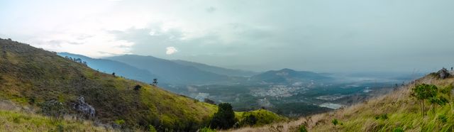 Panoramic View of A Hilltop at Dawn with Misty Distant Horizon - Download Free Stock Photos Pikwizard.com