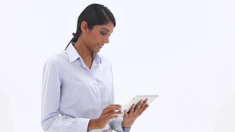 Professional Woman Engaging with Tablet Technology