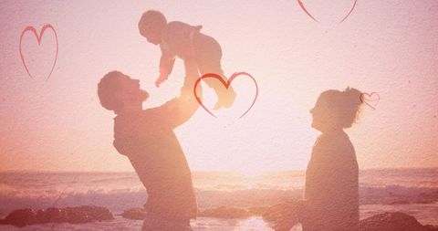 silhouettes of a family enjoying time at the beach during sunset, evoking warmth through heart motifs overlay. suitable for themes of family bonding, love, and leisure time. perfect for use in lifestyle blogs, social media campaigns, or family-oriented advertisements.